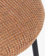 Fauteuil rétro Boucle avec 3 coloris et format polyvalent pour salon et salle à manger