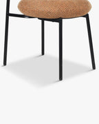 Fauteuil rétro Boucle avec 3 coloris et format polyvalent pour salon et salle à manger