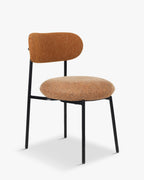 Fauteuil rétro Boucle avec 3 coloris et format polyvalent pour salon et salle à manger