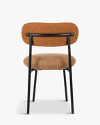 Fauteuil rétro Boucle avec 3 coloris et format polyvalent pour salon et salle à manger