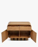 Buffet rétro en bois clair et bronze avec coins arrondis et pieds cylindriques pour salon
