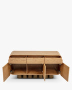 Buffet rétro en bois clair et bronze avec coins arrondis et pieds cylindriques pour salon