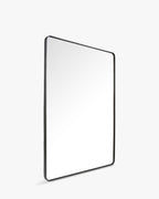 Miroir sculptural en bois/résine au design lumineux et à l'effet agrandissant pour toutes les pièces